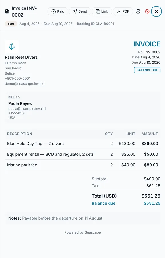 An invoice open on the screen: its lines, the tax line, the total, and the booking it belongs to.