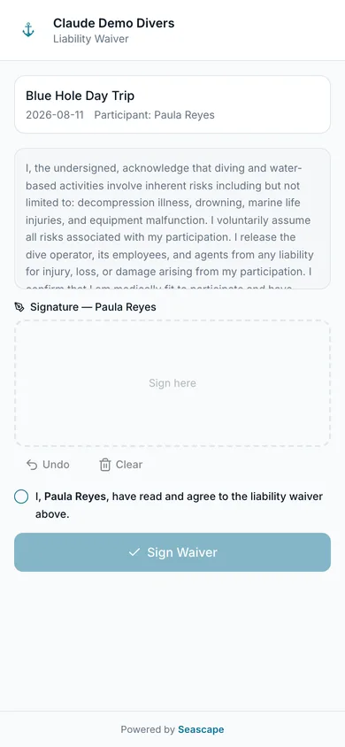 The liability waiver on a phone: the diver reads, signs with a finger, and it is filed against their booking.